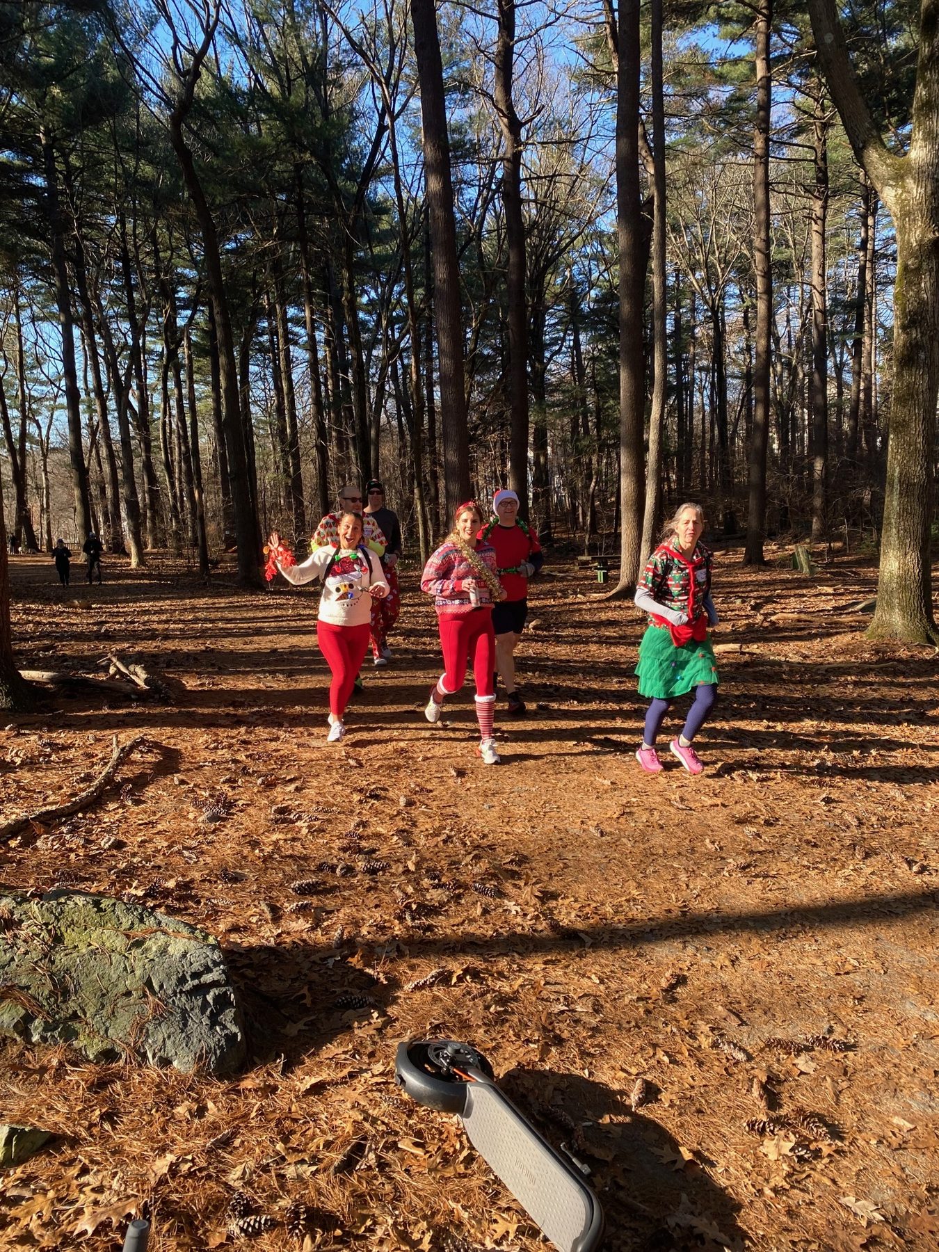 Gallopers in ugly sweaters on the trail through Menotomy Rocks Park